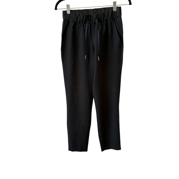 LULULEMON ON THE FLY PANTS TRAVEL WOVEN PULL ON POCKETS WORKOUT ATHLEISURE 2 - Picture 2 of 11